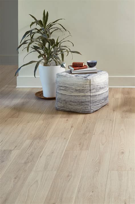 With quick and easy installation, it's the perfect flooring option for any room!. . Nucore rigid core luxury vinyl plank